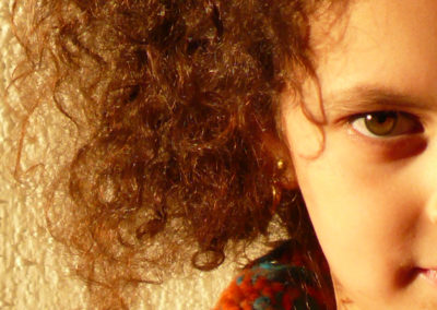 YOUNG GIRL IN THE SUN